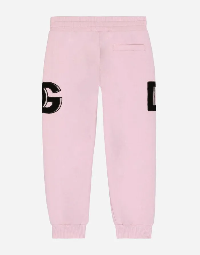 Dolce and Gabbana Trousers And Skirts Children Jersey Jogging Pants With DG Logo Patch Pink Dolce and Gabbana Trousers And Skirts Children Jersey Jogging Pants With DG Logo Patch Pink