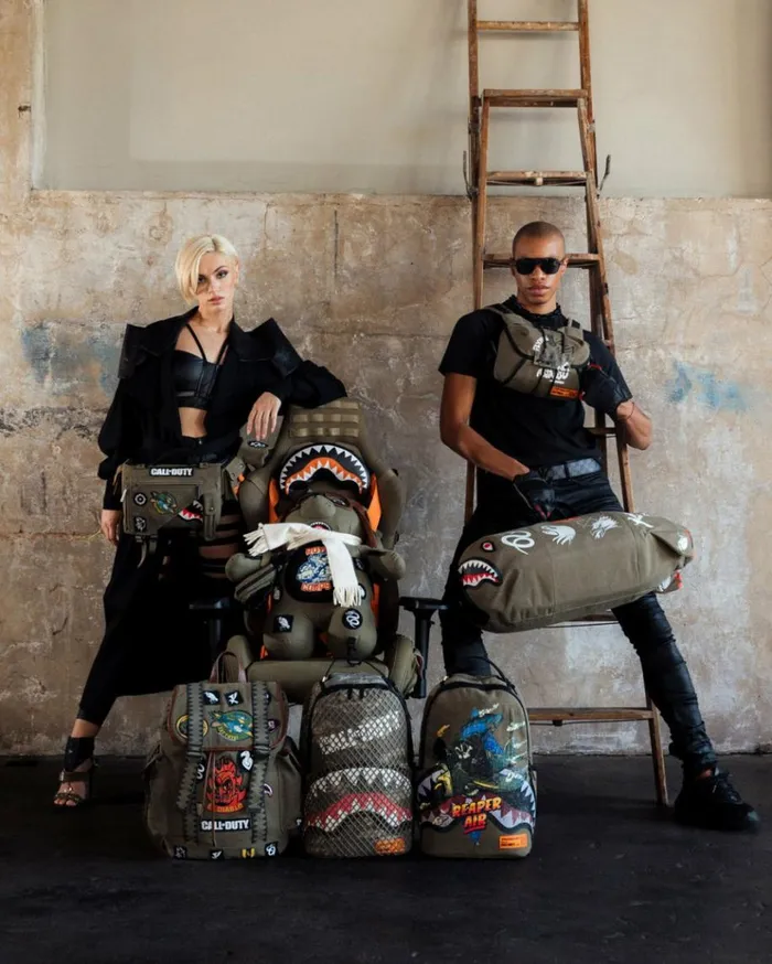 SPRAYGROUND CALL OF DUTY NEVER BACK DOWN CROSSBODY Bags